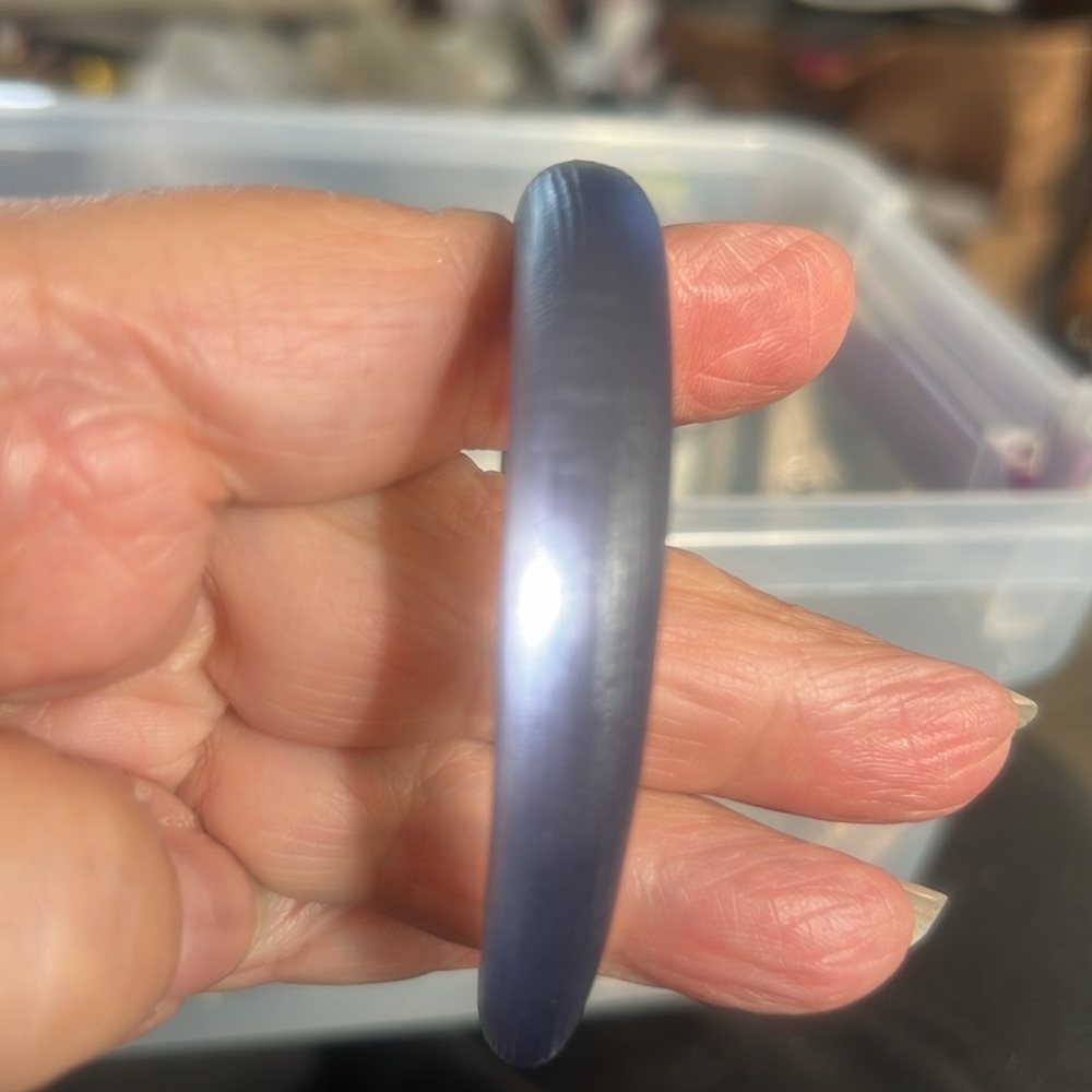 Steel blue Alexis Bittar bangle.